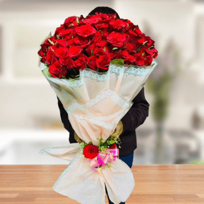 130 Red Rose Bouquet With Pink Paper