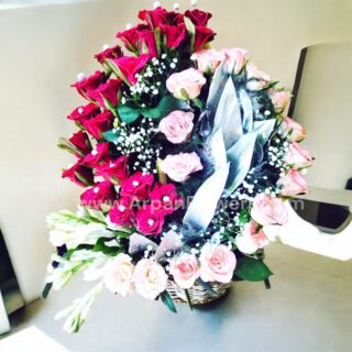 Red and pink roses Arrangement In Basket