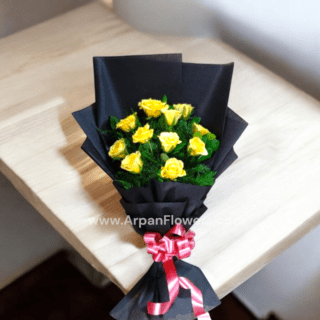 Yellow rose in Black paper packing Bouquet
