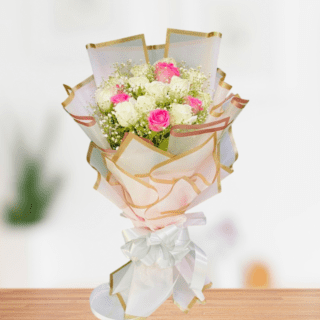 Pink And White Rose With Baby’s Breath in pink Paper packing Bouquet