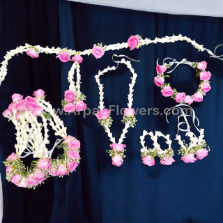 Pink Roses With Rajnigandha Flowers Jewelry