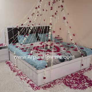 Bed Decoration With Rajni Chain and Rose Petals