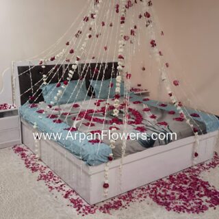 Bed Decoration With Rajni Chain and Rose Petals
