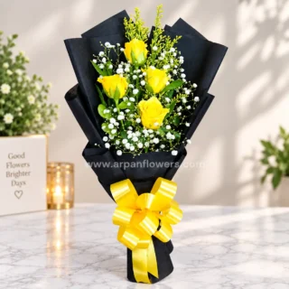 Yellow Rose in Black paper Bouquet