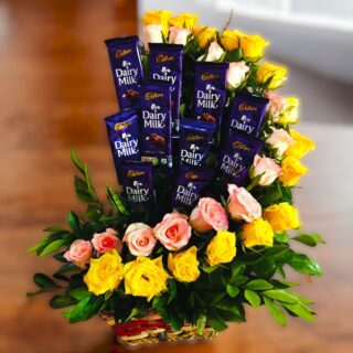Yellow and Pink Rose in Basket With chocolate