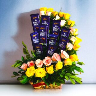Yellow and Pink Rose in Basket With chocolate