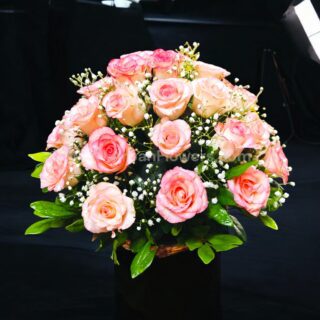 Pink Rose in Basket With Baby's Breath