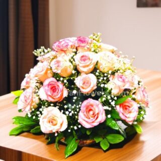 Pink Rose in Basket With Baby's Breath