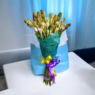 Home 20 Rajnigandha Bouquet with simple Packing.