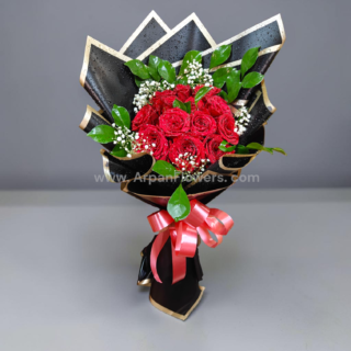 Red Rose in Black paper with Baby's breath