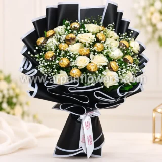 Chocolate and White Rose in Black Paper